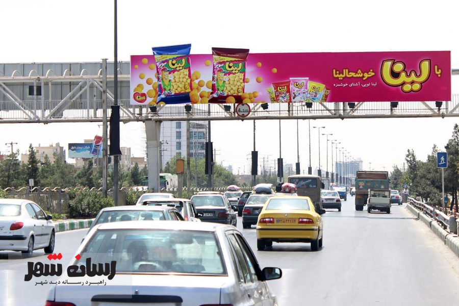 بزرگراه آزادی، مقابل آپارتمانهای لاله، به سمت میدان آزادی